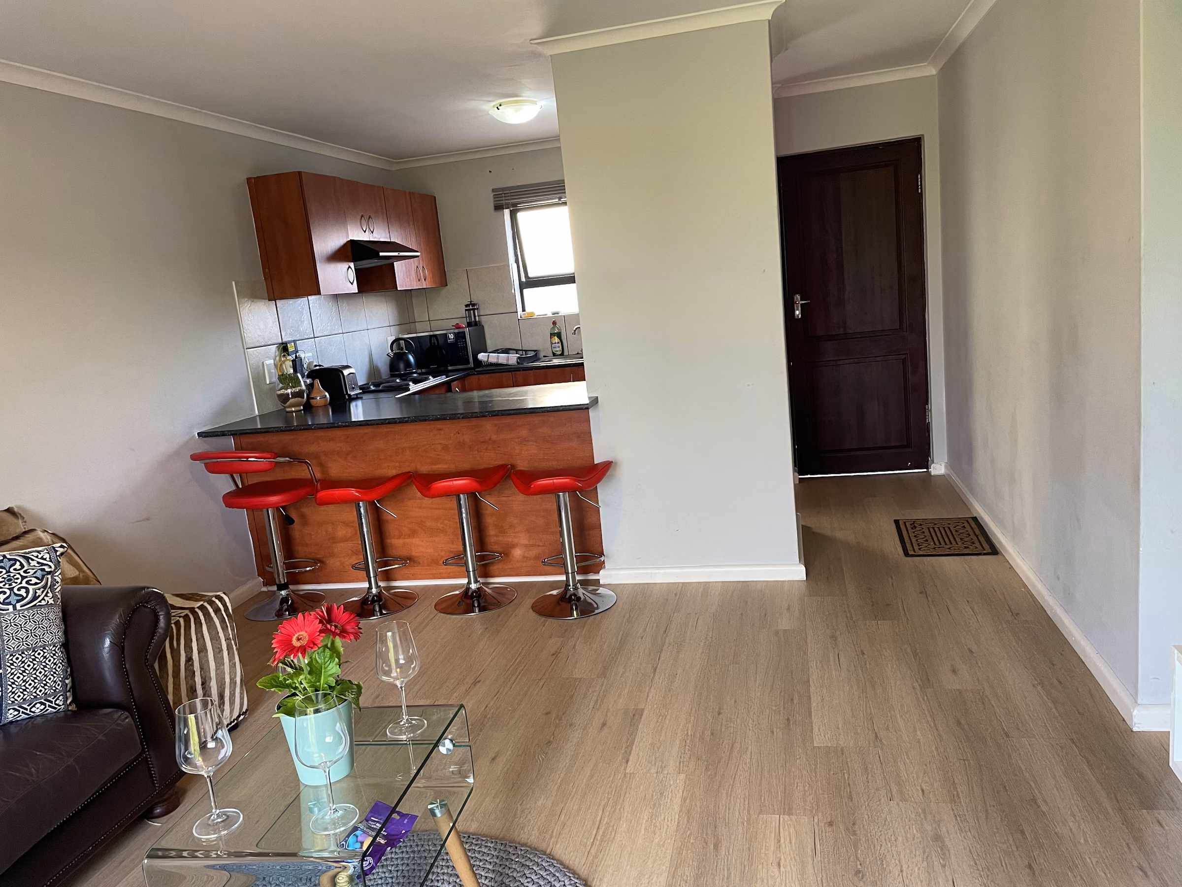 Living Area Looking At Kitchen — Mini Suits